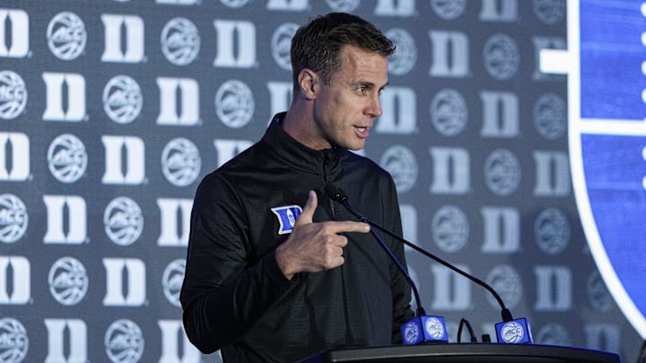 Oct 9, 2024; Charlotte, NC, USA;   Duke head coach John Scheyer makes a point during ACC Media Days at The Hilton Charlotte Uptown. Mandatory Credit: Jim Dedmon-Imagn Images