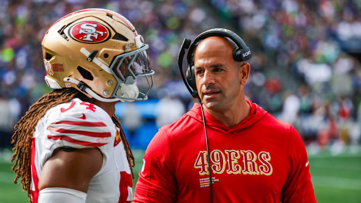 Sep 7, 2025; Seattle, Washington, USA; San Francisco 49ers defensive coordinator Robert Saleh talks with linebacker Fred Warner (54) during the fourth quarter against the Seattle Seahawks at Lumen Field. Mandatory Credit: Joe Nicholson-Imagn Images