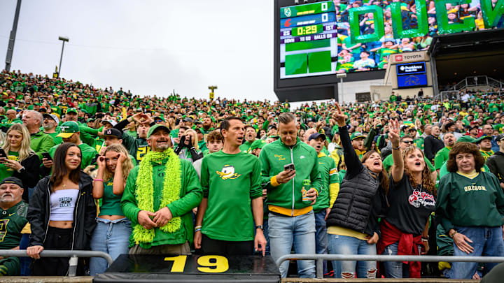 Oct 21, 2023; Eugene, Oregon, USA; Oregon Ducks fans cheer the team entrance against the Washington State Cougars at Autzen Stadium. Mandatory Credit: Craig Strobeck-USA TODAY Sports