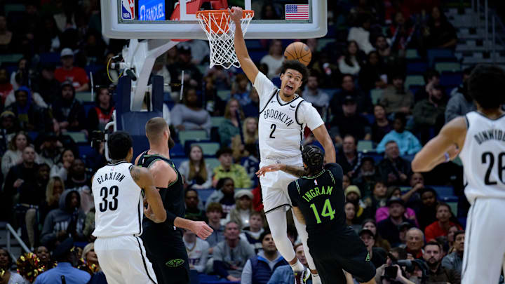 Jan 2, 2024; New Orleans, Louisiana, USA; Brooklyn Nets forward Cameron Johnson (2) attempts to dunk after New Orleans Pelicans forward Brandon Ingram (14) stole the ball during the first quarter at Smoothie King Center. Mandatory Credit: Matthew Hinton-Imagn Images