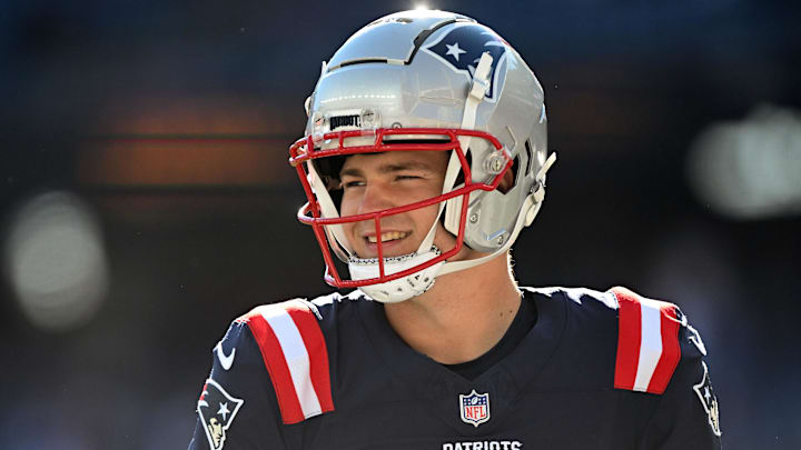Nov 17, 2024; Foxborough, Massachusetts, USA; New England Patriots quarterback Drake Maye (10) walks onto the field before a game against the Los Angeles Rams at Gillette Stadium. Mandatory Credit: Brian Fluharty-Imagn Images