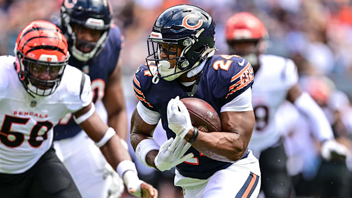 Aug 17, 2024; Chicago, Illinois, USA; Chicago Bears running back Khalil Herbert (24) runs the ball against the Cincinnati Bengals during the first quarter at Soldier Field.