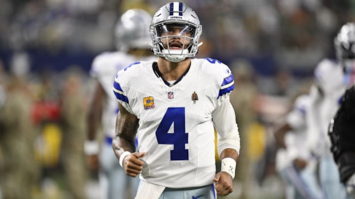 Dallas Cowboys quarterback Dak Prescott (4) looks on before the game against the Green Bay Packers at AT&;T Stadium. Dallas Cowboys quarterback Dak Prescott (4) looks on before the game against the Green Bay Packers at AT&;T Stadium.