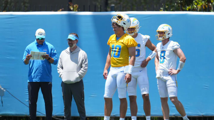 May 29, 2024; Costa Mesa, CA, USA; Los Angeles Chargers passing game coordinator Marcus Brady, quarterbacks coach Shane Day and quarterbacks Justin Herbert (10), Casey Bauman (16) and Max Duggan (8) during organized team activities at Hoag Performance Center. Mandatory Credit: Kirby Lee-USA TODAY Sports