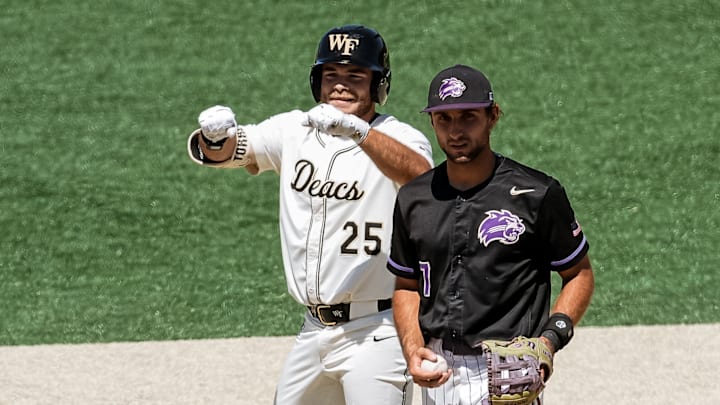 Wake Forest's Boston Torres reaches second base against the Western Carolina Catamounts.