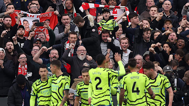 The away end celebrates Arsenal's devastating victory over West Ham