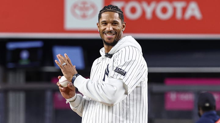 Sep 24, 2024; Bronx, New York, USA;  New York Knick guard Josh Hart throws out the first pitch before the game between the New York Yankees and the Baltimore Orioles at Yankee Stadium. Mandatory Credit: Vincent Carchietta-Imagn Images