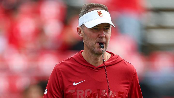 Sep 19, 2026; Piscataway, New Jersey, USA; USC Trojans head coach Lincoln Riley on the field during warm-ups before the game against the Rutgers Scarlet Knights at SHI Stadium. Mandatory Credit: Vincent Carchietta-Imagn Images Sep 19, 2026; Piscataway, New Jersey, USA; USC Trojans head coach Lincoln Riley on the field during warm-ups before the game against the Rutgers Scarlet Knights at SHI Stadium. Mandatory Credit: Vincent Carchietta-Imagn Images