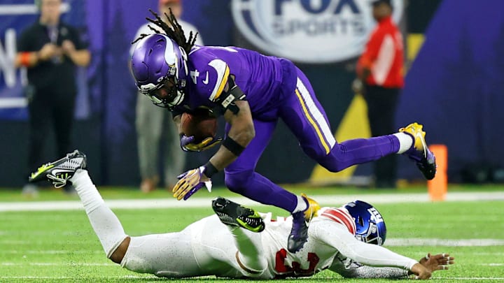Jan 15, 2023; Minneapolis, Minnesota, USA; Minnesota Vikings running back Dalvin Cook (4) gets