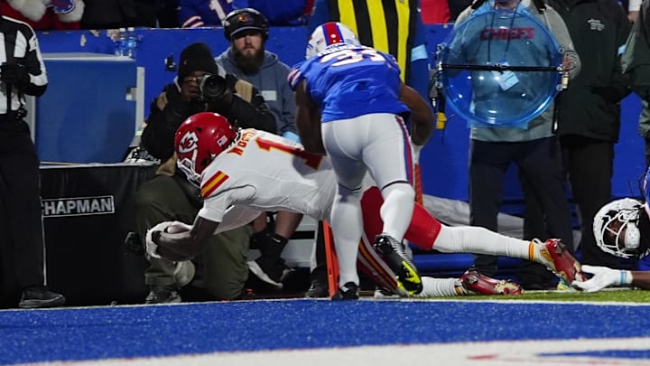 Nov 17, 2024; Orchard Park, New York, USA; Kansas City Chiefs wide receiver Xavier Worthy (1) dives for a touchdown against the Buffalo Bills during the first half at Highmark Stadium.