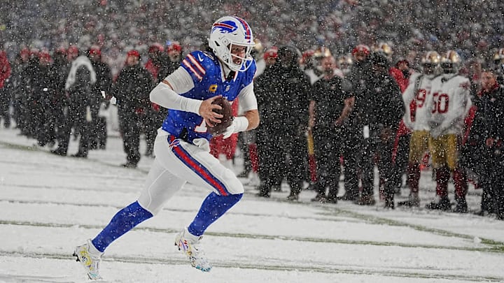 Bills quarterback Josh Allen runs towards the end zone after getting the ball back from Amari Cooper during second half action of their home game against the San Francisco 49ers in Orchard Park on Dec. 1, 2024.