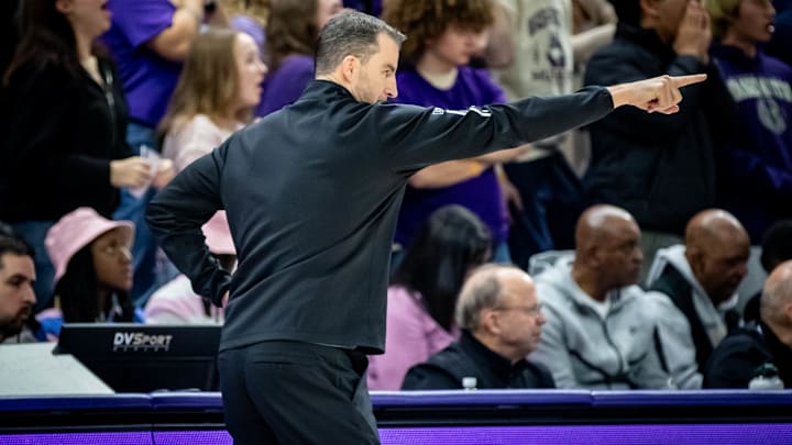 Danny Sprinkle is trying to keep the Huskies pointed in the right direction. Danny Sprinkle is trying to keep the Huskies pointed in the right direction.
