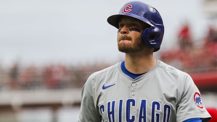 Jun 8, 2024; Cincinnati, Ohio, USA; Chicago Cubs outfielder Ian Happ (8) walks off the field