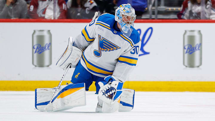 Apr 5, 2026; Denver, Colorado, USA; St. Louis Blues goaltender Joel Hofer (30) pushes his way to the bench after losing a skate blade in the third period against the Colorado Avalanche at Ball Arena. Mandatory Credit: Isaiah J. Downing-Imagn Images