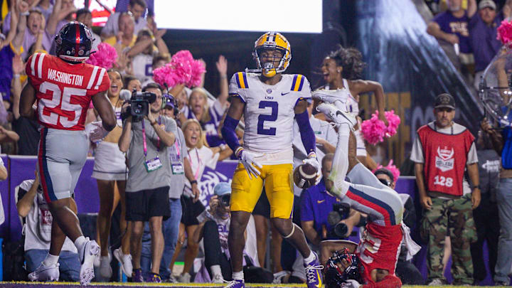 Oct 12, 2024; Baton Rouge, Louisiana, USA;  LSU Tigers wide receiver Kyren Lacy (2) scores a touchdown in overtime against the Mississippi Rebels at Tiger Stadium. Mandatory Credit: Stephen Lew-Imagn Images