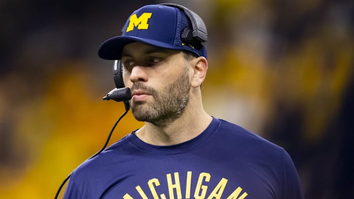 Dec 4, 2021; Indianapolis, IN, USA; Michigan Wolverines quarterbacks coach Matt Weiss against the Iowa Hawkeyes in the Big Ten Conference championship game at Lucas Oil Stadium. Mandatory Credit: Mark J. Rebilas-Imagn Images Dec 4, 2021; Indianapolis, IN, USA; Michigan Wolverines quarterbacks coach Matt Weiss against the Iowa Hawkeyes in the Big Ten Conference championship game at Lucas Oil Stadium. Mandatory Credit: Mark J. Rebilas-Imagn Images