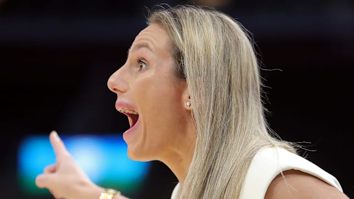 Buffalo Bulls head coach Becky Burke works the sideline during the first half of the Mid-American Conference Tournament women's championship game at Rocket Mortgage FieldHouse, Saturday, March 16, 2024, in Cleveland, Ohio. Buffalo Bulls head coach Becky Burke works the sideline during the first half of the Mid-American Conference Tournament women's championship game at Rocket Mortgage FieldHouse, Saturday, March 16, 2024, in Cleveland, Ohio.