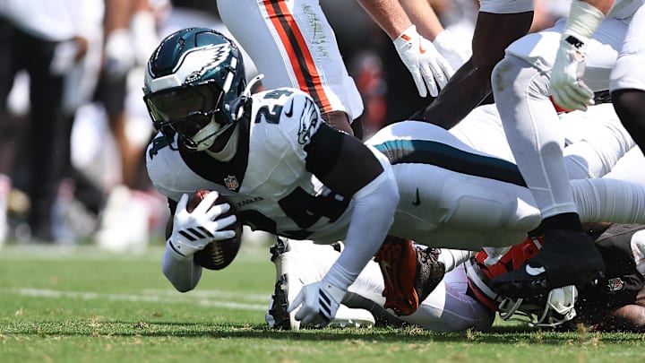 Aug 16, 2025; Philadelphia, Pennsylvania, USA; Philadelphia Eagles safety Andrew Mukuba (24) recovers a fumble against the Cleveland Browns during the second quarter at Lincoln Financial Field. Mandatory Credit: Bill Streicher-Imagn Images