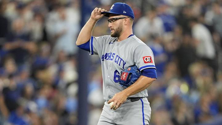 Aug 27, 2026; Toronto, Ontario, CAN;  Kansas City Royals pitcher Noah Cameron (65) reacts after giving up a double in the sixth inning against the Toronto Blue Jays at Rogers Centre.  Mandatory Credit: John E. Sokolowski-Imagn Images