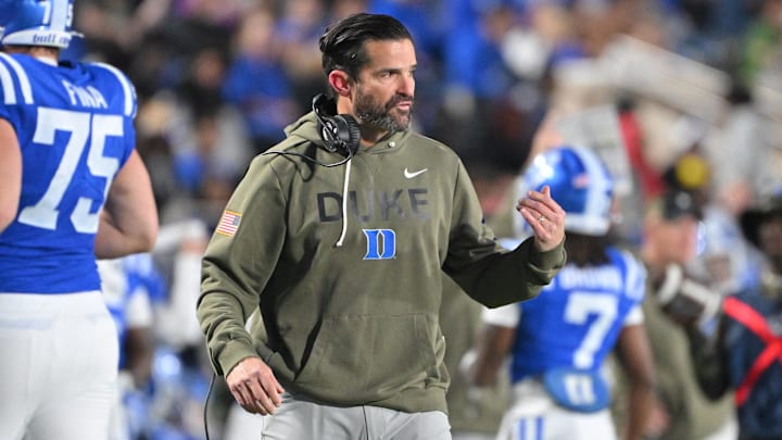 Nov 15, 2025; Durham, North Carolina, USA; Duke Blue Devils head coach Manny Diaz reacts during the third quarter against the Virginia Cavaliers at Wallace Wade Stadium. Nov 15, 2025; Durham, North Carolina, USA; Duke Blue Devils head coach Manny Diaz reacts during the third quarter against the Virginia Cavaliers at Wallace Wade Stadium.