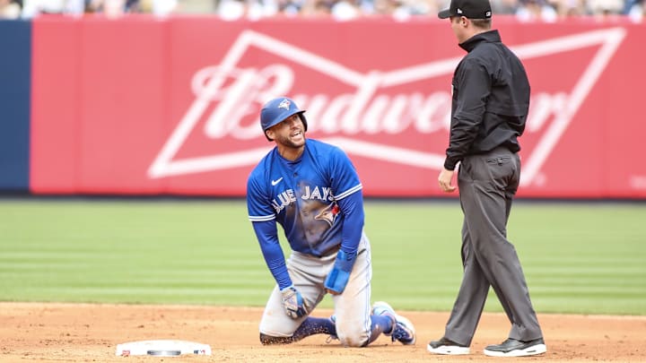 Apr 22, 2023; Bronx, New York, USA; Toronto Blue Jays right fielder George Springer (4) argues with umpire Junior Valentine (25) after being called out at second base trying to steal in the fifth inning against the New York Yankees at Yankee Stadium. Mandatory Credit: Wendell Cruz-Imagn Images Apr 22, 2023; Bronx, New York, USA; Toronto Blue Jays right fielder George Springer (4) argues with umpire Junior Valentine (25) after being called out at second base trying to steal in the fifth inning against the New York Yankees at Yankee Stadium. Mandatory Credit: Wendell Cruz-Imagn Images