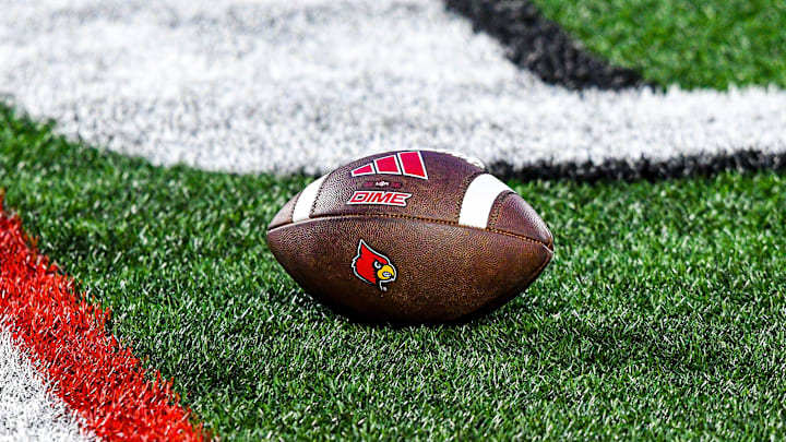 A football lies on the turf of L&N Stadium during Louisville's spring game.