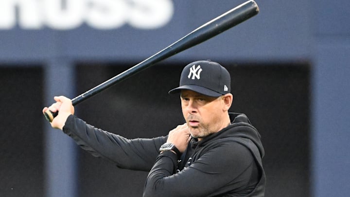 Oct 3, 2025; Toronto, Ontario, Canada; New York Yankees manager Aaron Boone (17) watches his players during workouts at Rogers Centre. Mandatory Credit: Dan Hamilton-Imagn Images