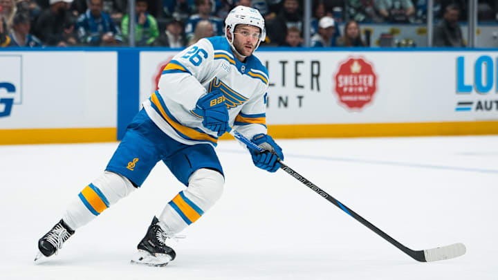 Oct 13, 2025; Vancouver, British Columbia, CAN; St. Louis Blues forward Nathan Walker (26) skates against the Vancouver Canucks in the third period at Rogers Arena. Mandatory Credit: Bob Frid-Imagn Images
