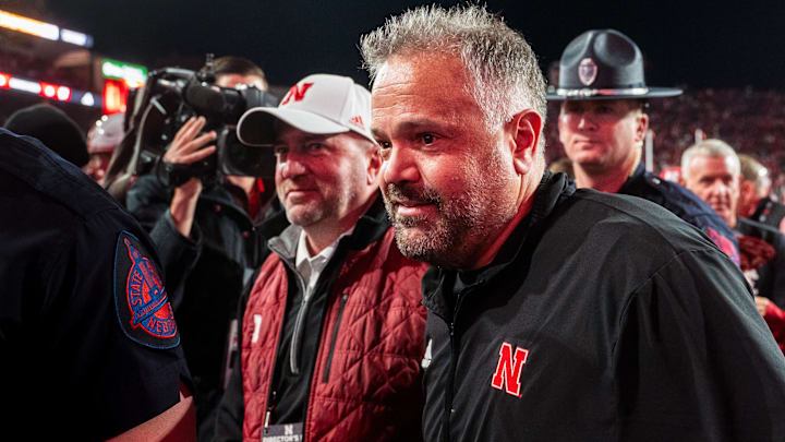 Matt Rhule and Troy Dannen walk off the field after defeating the Wisconsin Badgers at Memorial Stadium. Matt Rhule and Troy Dannen walk off the field after defeating the Wisconsin Badgers at Memorial Stadium.