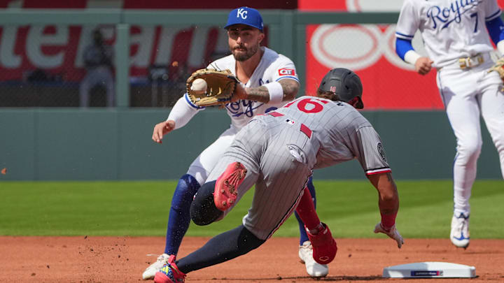 Mar 30, 2026; Kansas City, Missouri, USA; Kansas City Royals second baseman Jonathan India (6) gets the tag on Minnesota Twins left fielder Austin Martin (16) trying to steal second base in the first inning at Kauffman Stadium. Mar 30, 2026; Kansas City, Missouri, USA; Kansas City Royals second baseman Jonathan India (6) gets the tag on Minnesota Twins left fielder Austin Martin (16) trying to steal second base in the first inning at Kauffman Stadium.
