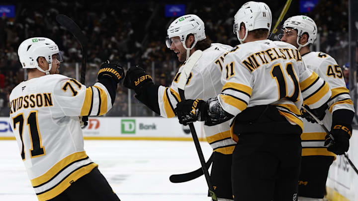 Jan 10, 2026; Boston, Massachusetts, USA; Boston Bruins left wing Viktor Arvidsson (71) congratulates center Pavel Zacha (18) after he scored against the New York Rangers during the first period at TD Garden. Mandatory Credit: Winslow Townson-Imagn Images