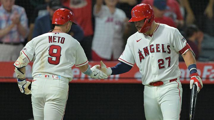 Aug 29, 2026; Anaheim, California, USA;  Los Angeles Angels shortstop Zach Neto (9) is congratulated by center fielder Mike Trout (27) after hitting a solo home run to tie the score in the eighth inning against the Philadelphia Phillies at Angel Stadium. Mandatory Credit: Jayne Kamin-Oncea-Imagn Images