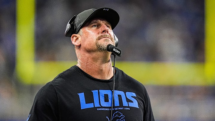 Detroit Lions head coach Dan Campbell watches a replay against Houston Texans during the first half at Ford Field in Detroit on Saturday, August 23, 2025.