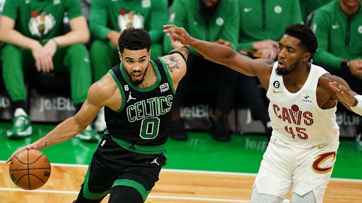 Boston Celtics forward Jayson Tatum (0) drives the ball.