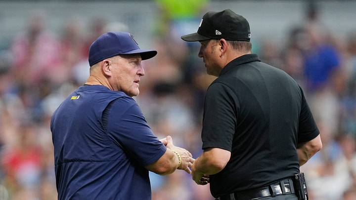 Milwaukee Brewers manager Pat Murphy challenges the home-plate collision call where Milwaukee Brewers center fielder Garrett Mitchell (5) was called out at home during the third inning of the game at American Family Field in Milwaukee, Wisconsin on July 1, 2026.