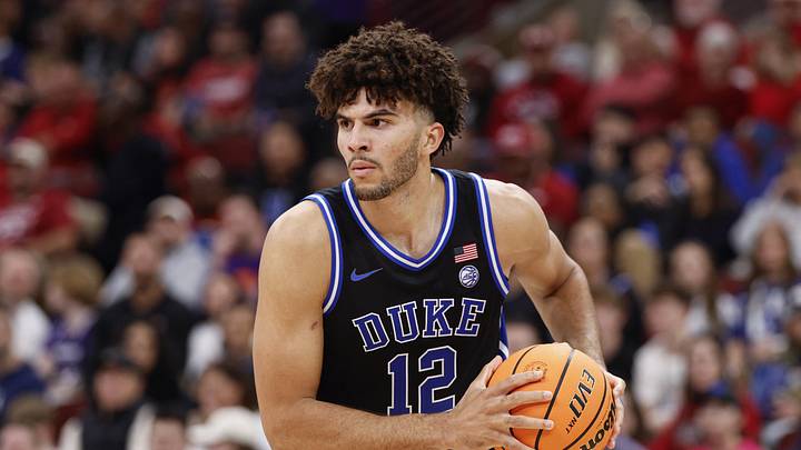Nov 27, 2025; Chicago, Illinois, USA; Duke Blue Devils forward Cameron Boozer (12) looks to pass the ball against Arkansas Razorbacks during the second half at United Center. Mandatory Credit: Kamil Krzaczynski-Imagn Images Nov 27, 2025; Chicago, Illinois, USA; Duke Blue Devils forward Cameron Boozer (12) looks to pass the ball against Arkansas Razorbacks during the second half at United Center. Mandatory Credit: Kamil Krzaczynski-Imagn Images