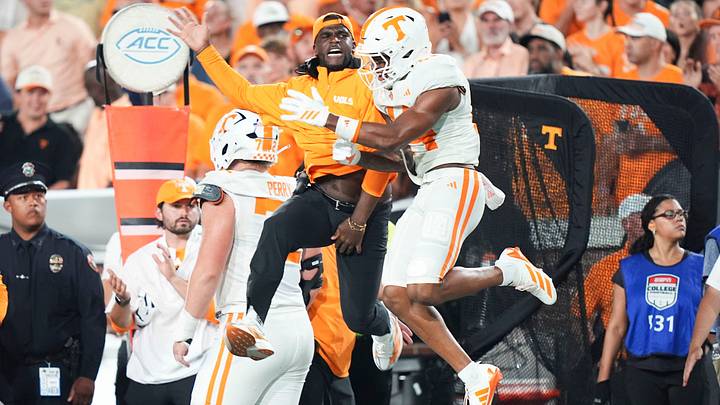 Wide receivers coach Kelsey Pope celebrates with Tennessee wide receiver Braylon Staley (14) during a college football game between Tennessee and Georgia Tech at Bobby Dodd Stadium in Atlanta, Ga., on Sept. 12, 2026. Wide receivers coach Kelsey Pope celebrates with Tennessee wide receiver Braylon Staley (14) during a college football game between Tennessee and Georgia Tech at Bobby Dodd Stadium in Atlanta, Ga., on Sept. 12, 2026.
