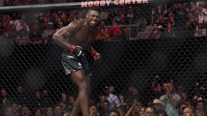 Jun 18, 2022; Austin, Texas, USA;  Joaquin Buckley (red gloves) reacts in his fight with Albert