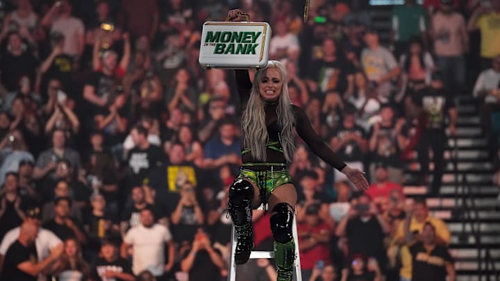 Jul 2, 2022; Las Vegas, NV, USA; Liv Morgan celebrates during the women   s Money In The Bank Match during Money In The Bank at MGM Grand Garden Arena. Mandatory Credit: Joe Camporeale-USA TODAY Sports