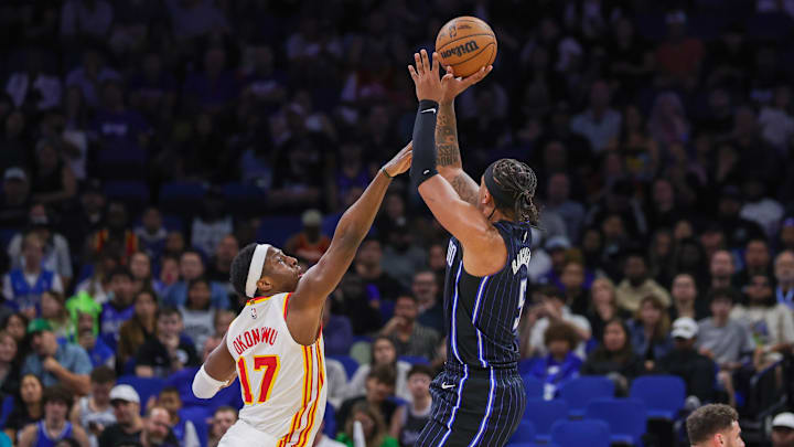 Orlando Magic forward Paolo Banchero (5) shoots against Atlanta Hawks forward Onyeka Okongwu (17) during the second quarter at Kia Center.