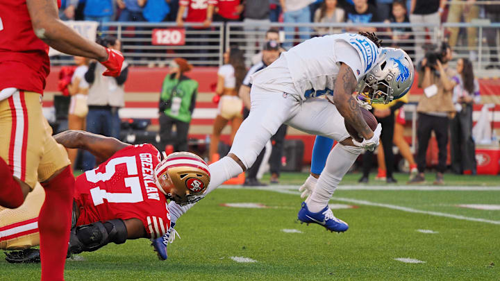 Jan 28, 2024; Santa Clara, California, USA; Detroit Lions wide receiver Jameson Williams (9) runs with the ball for a touchdown San Francisco 49ers linebacker Dre Greenlaw (57) during the first half of the NFC Championship football game at Levi's Stadium. Mandatory Credit: Kelley L Cox-Imagn Images Jan 28, 2024; Santa Clara, California, USA; Detroit Lions wide receiver Jameson Williams (9) runs with the ball for a touchdown San Francisco 49ers linebacker Dre Greenlaw (57) during the first half of the NFC Championship football game at Levi's Stadium. Mandatory Credit: Kelley L Cox-Imagn Images
