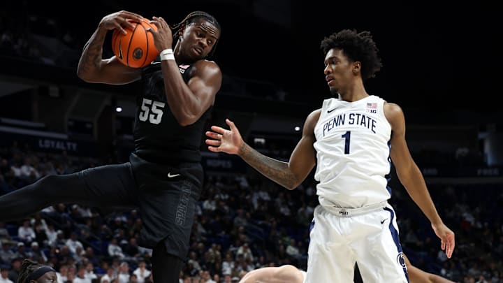 13, 2025; University Park, Pennsylvania, USA; Michigan State Spartans forward Coen Carr (55) jumps for the rebound during the first half against the Penn State Nittany Lions at Bryce Jordan Center. Mandatory Credit: Matthew O'Haren-Imagn Images 13, 2025; University Park, Pennsylvania, USA; Michigan State Spartans forward Coen Carr (55) jumps for the rebound during the first half against the Penn State Nittany Lions at Bryce Jordan Center. Mandatory Credit: Matthew O'Haren-Imagn Images