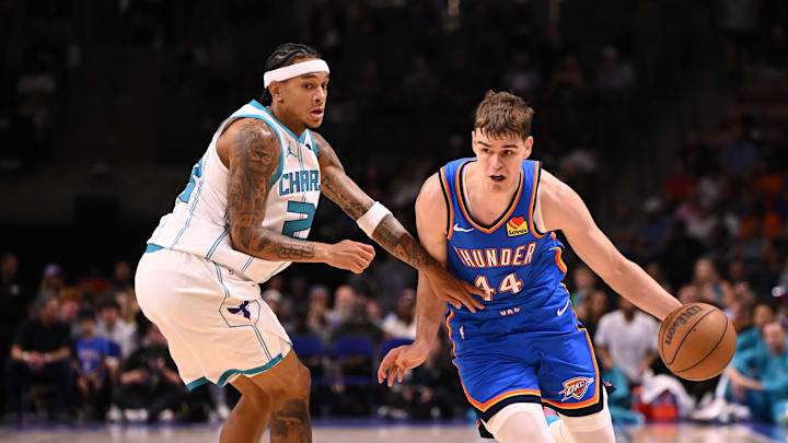 Oct 5, 2025; North Charleston, South Carolina, USA; Oklahoma City Thunder guard Nikola Topic (44) drives up the court against the Charlotte Hornets in the first quarter at North Charleston Coliseum. Mandatory Credit: Arthur Ellis-Imagn Images