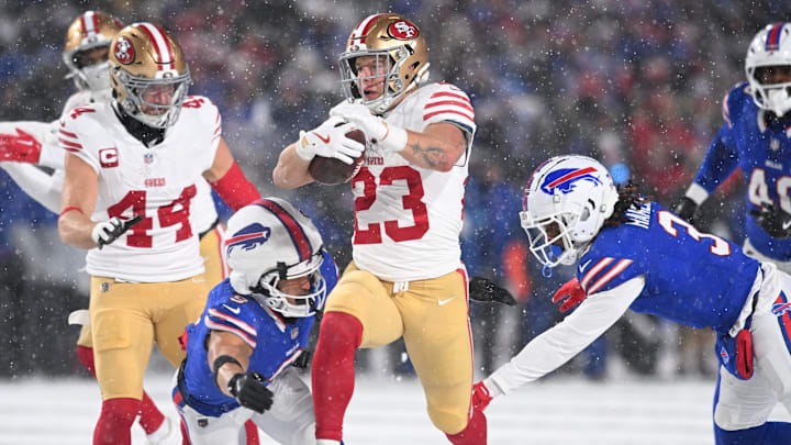 Dec 1, 2024; Orchard Park, New York, USA; San Francisco 49ers running back Christian McCaffrey (23) is tackled by Buffalo Bills safety Taylor Rapp (9) and safety Damar Hamlin (3) in the second quarter at Highmark Stadium. Mandatory Credit: Mark Konezny-Imagn Images Dec 1, 2024; Orchard Park, New York, USA; San Francisco 49ers running back Christian McCaffrey (23) is tackled by Buffalo Bills safety Taylor Rapp (9) and safety Damar Hamlin (3) in the second quarter at Highmark Stadium. Mandatory Credit: Mark Konezny-Imagn Images