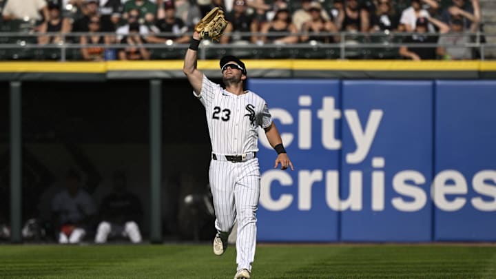 Jun 28, 2025; Chicago, Illinois, USA; Chicago White Sox outfielder Andrew Benintendi (23) catches a fly ball hit by San Francisco Giants second baseman Christian Koss (50)(not pictured) during the eighth inning at Rate Field. Mandatory Credit: Matt Marton-Imagn Images