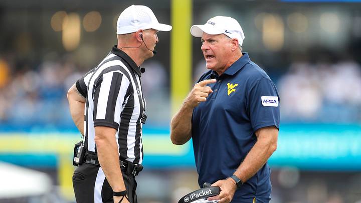 Sep 5, 2026; Morgantown, West Virginia, USA; West Virginia Mountaineers head coach Rich Rodriguez argues a cal with the referee during the third quarter against the Coastal Carolina Chanticleers at Milan Puskar Stadium. Mandatory Credit: Ben Queen-Imagn Images Sep 5, 2026; Morgantown, West Virginia, USA; West Virginia Mountaineers head coach Rich Rodriguez argues a cal with the referee during the third quarter against the Coastal Carolina Chanticleers at Milan Puskar Stadium. Mandatory Credit: Ben Queen-Imagn Images