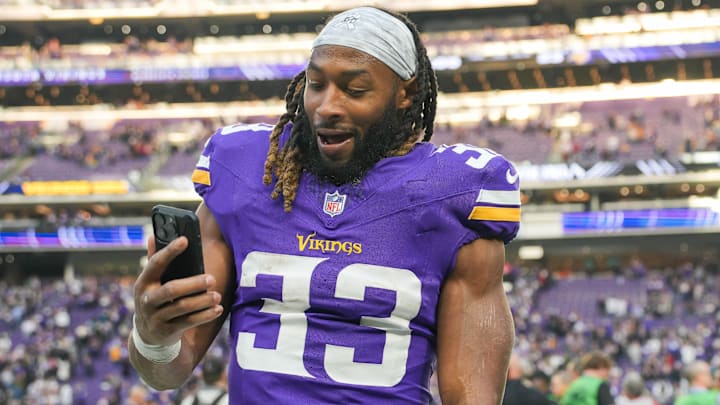 Dec 1, 2024; Minneapolis, Minnesota, USA; Minnesota Vikings running back Aaron Jones (33) after the game against the Arizona Cardinals at U.S. Bank Stadium. Dec 1, 2024; Minneapolis, Minnesota, USA; Minnesota Vikings running back Aaron Jones (33) after the game against the Arizona Cardinals at U.S. Bank Stadium.