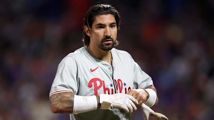 Oct 8, 2024; New York City, New York, USA; Philadelphia Phillies outfielder Nick Castellanos (8) reacts in the eighth inning against the New York Mets during game three of the NLDS for the 2024 MLB Playoffs at Citi Field. Mandatory Credit: Vincent Carchietta-Imagn Images