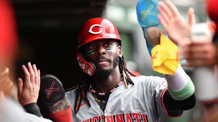 Sep 29, 2024; Chicago, Illinois, USA; Cincinnati Reds shortstop Elly De La Cruz (44) celebrates with teammates in the dugout after scoring during the tenth inning against the Chicago Cubs at Wrigley Field. Mandatory Credit: Patrick Gorski-Imagn Images