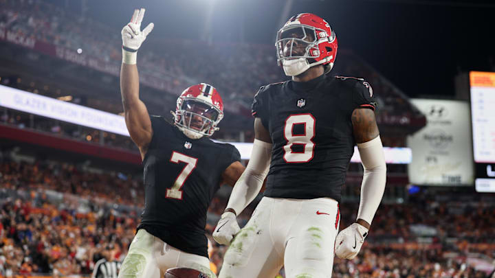 Dec 11, 2025; Tampa, Florida, USA; Atlanta Falcons tight end Kyle Pitts Sr. (8) celebrates with running back Bijan Robinson (7) after scoring a touchdown against the Tampa Bay Buccaneers during the second quarter at Raymond James Stadium. Mandatory Credit: Nathan Ray Seebeck-Imagn Images Dec 11, 2025; Tampa, Florida, USA; Atlanta Falcons tight end Kyle Pitts Sr. (8) celebrates with running back Bijan Robinson (7) after scoring a touchdown against the Tampa Bay Buccaneers during the second quarter at Raymond James Stadium. Mandatory Credit: Nathan Ray Seebeck-Imagn Images